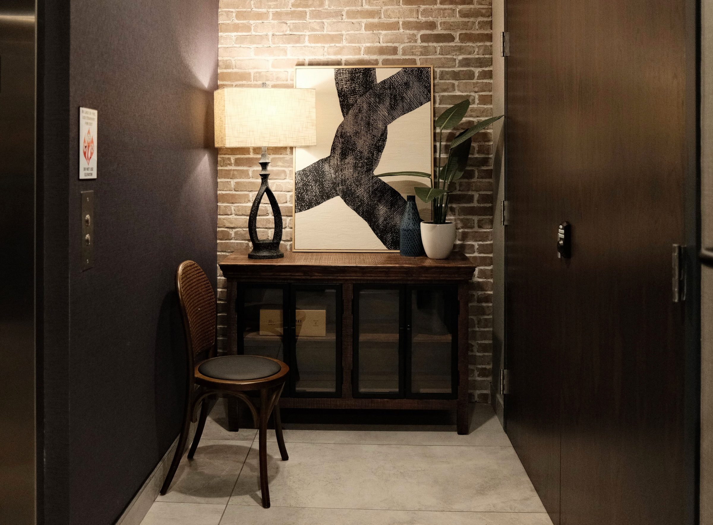 Second Floor Elevator Landing - Private keycode-secured elevator access to the guest suites. | Sterling Suites Ybor City Tampa