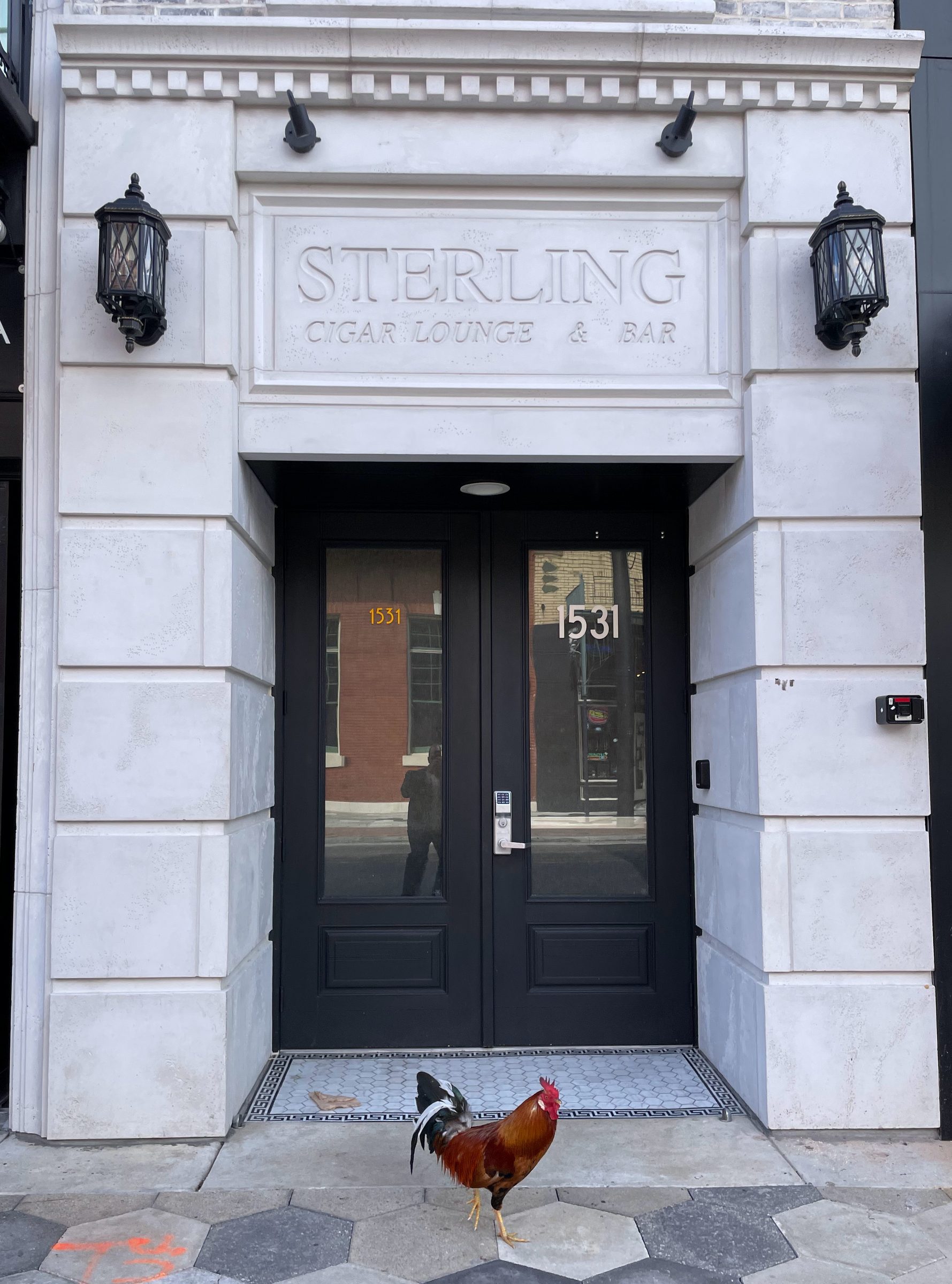 The Historic 1531 Entrance - The original arched doorway and masonry that inspired the official Sterling Suites brand crest. | Sterling Suites Ybor City Tampa