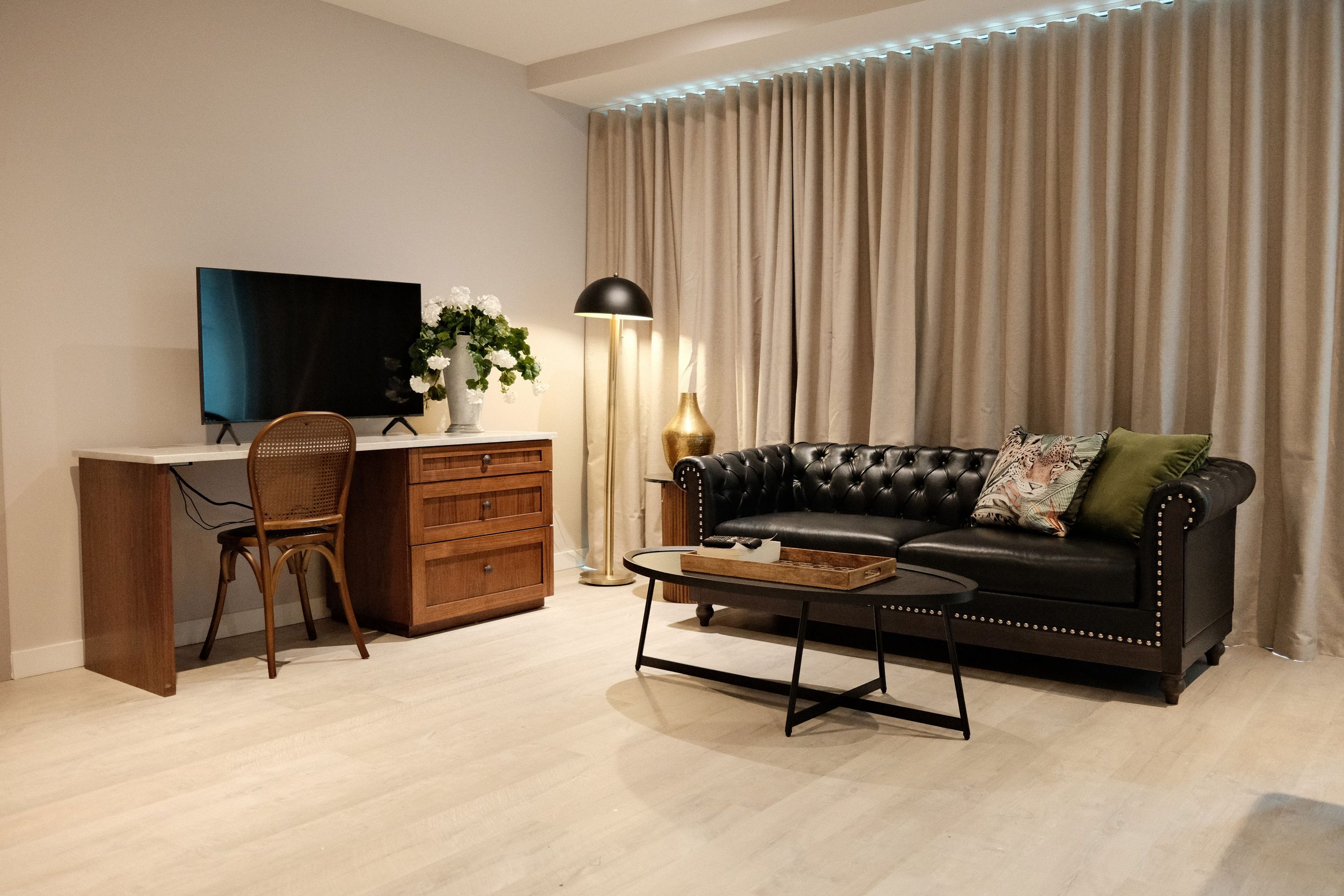 Restored brick interior and elegant luxury suite living room in Ybor City Tampa