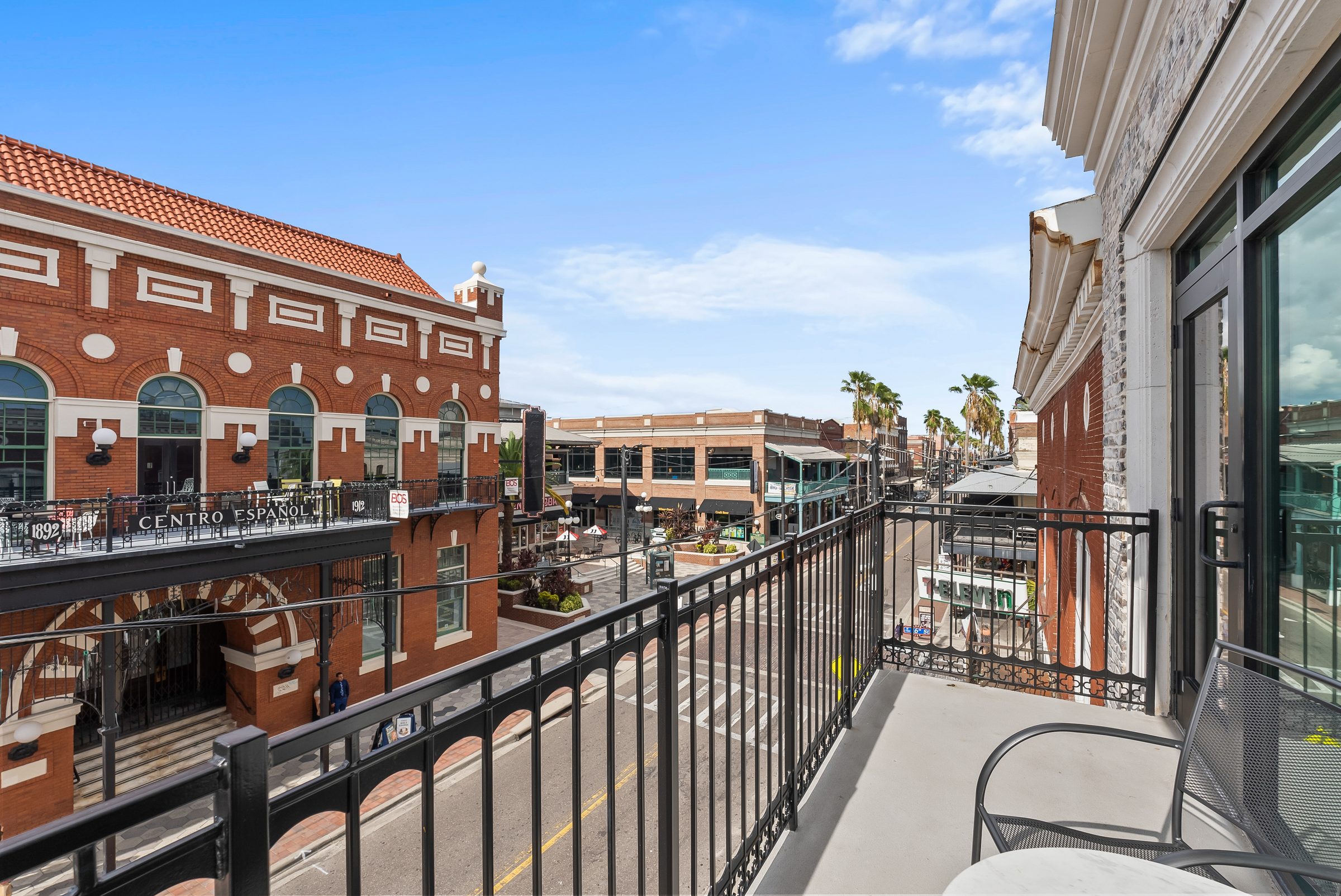 Private suite balcony view overlooking Historic 7th Avenue Ybor City lodging